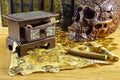 Wooden box with key and skull