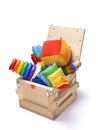 Wooden box with many toys Royalty Free Stock Photo