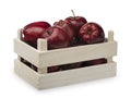 Wooden box with red apples isolatd.