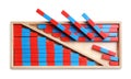 Wooden box with red and blue numerical sticks isolated on white, top view. Montessori math toy