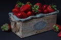 Wooden box of red strawberries  close-up view Royalty Free Stock Photo