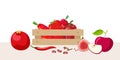 Wooden box with red vegetables and fruits. Red halthy food in wooden box isolated on white. Fresh organic food for menu