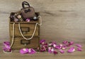 Wooden box with rose petals desaturated