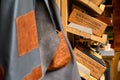 Wooden boxes displaying leather goods at a market stall in Camden Lock Markets Royalty Free Stock Photo