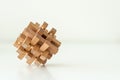 Wooden Brain Teaser on White Background Royalty Free Stock Photo