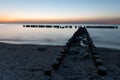 Wooden breakwater at sunset on the Baltic Sea Royalty Free Stock Photo