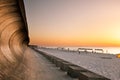 Wooden breakwater at sunset on the Baltic Sea Royalty Free Stock Photo