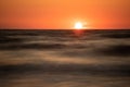 Wooden breakwater at sunset on the Baltic Sea Royalty Free Stock Photo