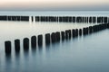 Wooden breakwater at sunset on the Baltic Sea Royalty Free Stock Photo