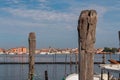 Sottomarina - Wooden briccola in Sottomarina, Veneto, Northern Italy, Europe. Panoramic view on idyllic harbor