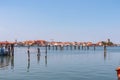 Sottomarina - Wooden briccola in Sottomarina, Veneto, Northern Italy, Europe. Panoramic view on idyllic harbor