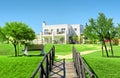 Wooden bridge and bench on golf course estate Royalty Free Stock Photo