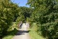 wooden bridge with bike path crosses Donau river near Thiergarten, Germany