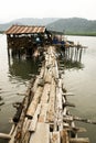 wooden bridge boat pier rural sea shore Royalty Free Stock Photo