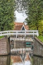 Wooden bridge, brick abutments