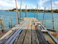 A wooden bridge built in the port of Malin Island against the backdrop of the blue sea Royalty Free Stock Photo