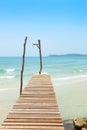 Wooden bridge, corridor to the sea on Beautiful crystal clear se