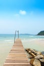 Wooden bridge, corridor to the sea on Beautiful crystal clear se Royalty Free Stock Photo