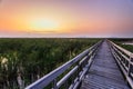 Wooden bridge cross around marsh in sunset time at Sam Roi Yot National Park,Thailand