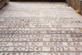 Wooden bridge with engraved geographical distances of world capitals from istanbul turkey to dakka