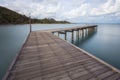 The wooden bridge extending into the sea. Khao Laem Ya National Park, Rayong, Thailand Royalty Free Stock Photo