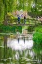 Wooden bridge in the gardens Royalty Free Stock Photo