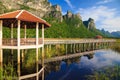 Wooden Bridge in lake at national park, Thailand