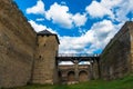 A wooden bridge leading to the entrance to the fortress. Khotyn, Kamenetz-Podolsk Royalty Free Stock Photo