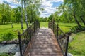 Wooden bridge with metal railings