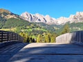 Wooden bridge on Monte Pana with a view of Mount Pic Royalty Free Stock Photo
