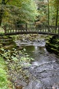 Wooden Bridge over Beck near Hardraw Force Waterfall, North Yorkshire, England, UK Royalty Free Stock Photo