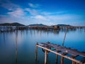 Wooden bridge over lake against sky Royalty Free Stock Photo