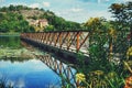 Wooden bridge over lake in summer Royalty Free Stock Photo