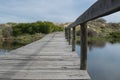 Wooden bridge over a lake Royalty Free Stock Photo