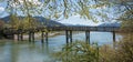 Wooden bridge over mangfall river, view to lake tegernsee Royalty Free Stock Photo