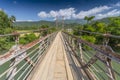 Wooden bridge over Nam Song river near Vang Vieng, Laos Royalty Free Stock Photo