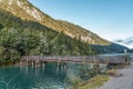 Wooden bridge over Plansee lake in Austria morning