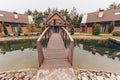 Wooden bridge over pond Royalty Free Stock Photo