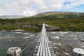 Wooden bridge over river