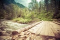 Wooden bridge over river