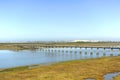 Wooden bridge over the San Pedro River in ToruÃ±os marsh. Bay of Cadiz Natural Park, Spain. Royalty Free Stock Photo