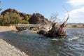 A wooden bridge over a small mountain creek at central Mongolia Royalty Free Stock Photo