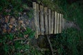 Wooden bridge over a stream in the park Royalty Free Stock Photo