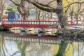 Wooden bridge over stream in public park Royalty Free Stock Photo