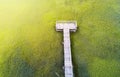 Wooden bridge over a swamp from above Royalty Free Stock Photo