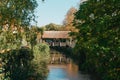 A wooden bridge in the park with and autumn colors of Bietigheim-Bissingen, Germany. Europe. Autumn landscape in nature Royalty Free Stock Photo