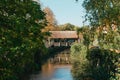 A wooden bridge in the park with and autumn colors of Bietigheim-Bissingen, Germany. Europe. Autumn landscape in nature Royalty Free Stock Photo