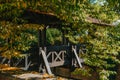 A wooden bridge in the park with and autumn colors of Bietigheim-Bissingen, Germany. Europe. Autumn landscape in nature Royalty Free Stock Photo