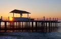 Wooden bridge pier against a beautiful sky measure used for natural background, background and multi-stage sea Royalty Free Stock Photo