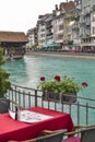 Wooden bridge and restaurant table. Switzerland. Royalty Free Stock Photo